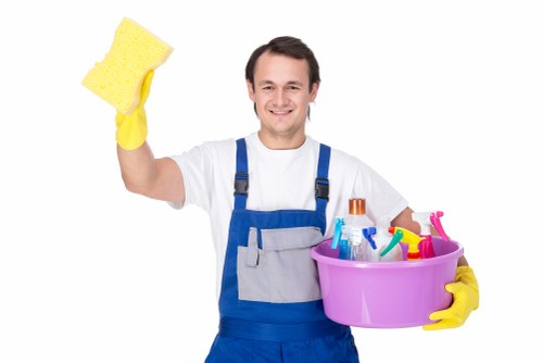 A cleaner vacuuming carpets in a rental property