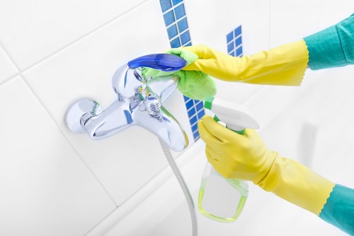 Detailed bathroom sanitizing during move in cleaning